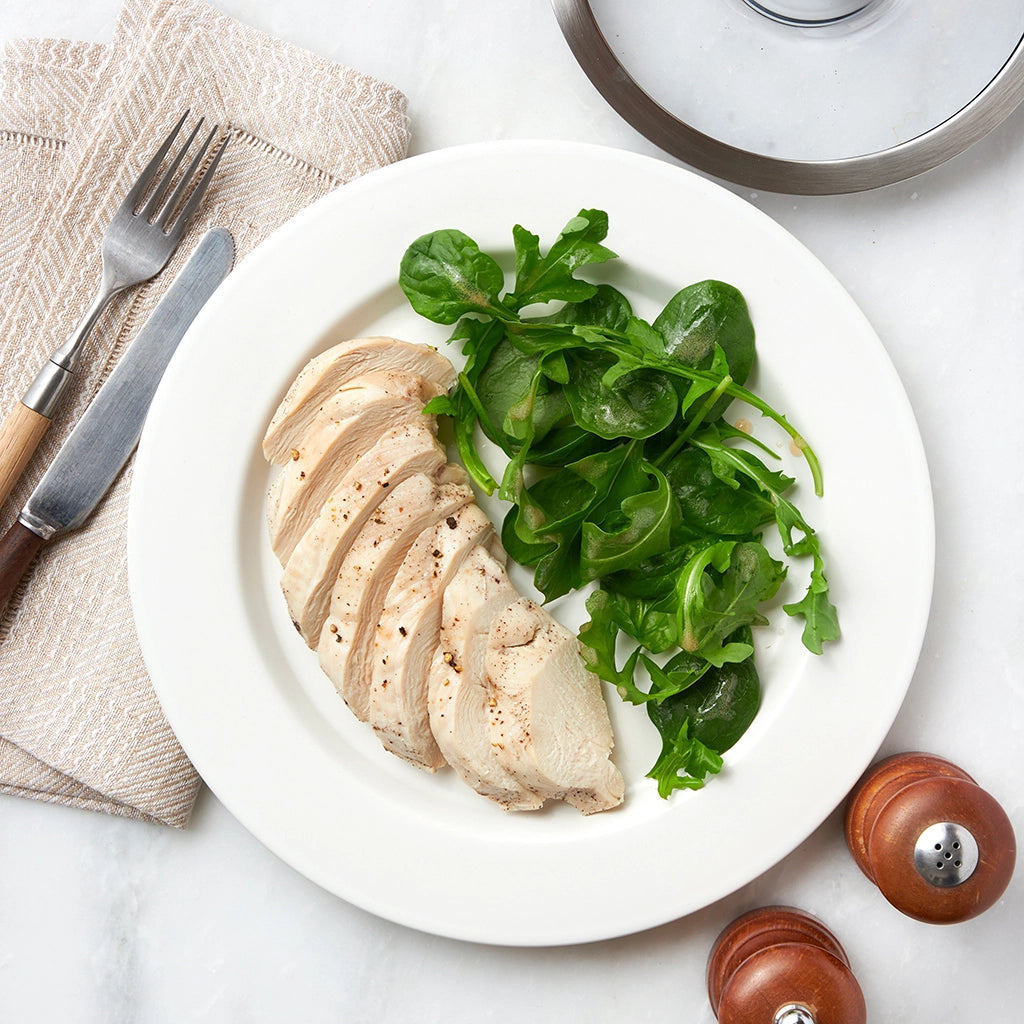 Perfectly cooked chicken breast made and served in the glass Anyday dish, providing a tender and juicy protein option. This method ensures evenly cooked chicken breast, reducing unwanted aromas, ideal for adding to salads, sandwiches, or main dishes.