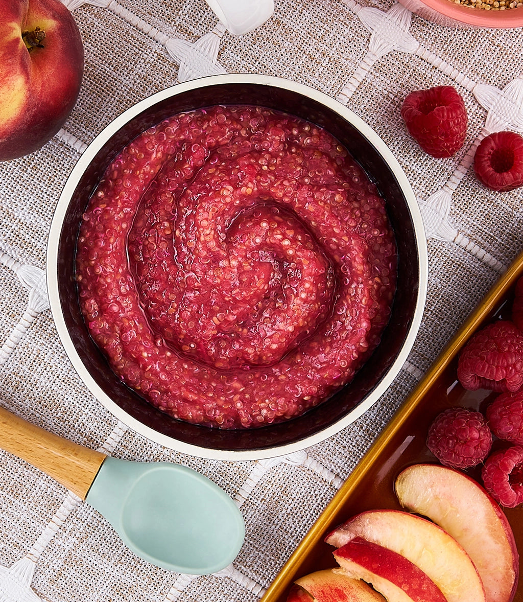 Nutritious peach, raspberry, and quinoa purée made in the glass Anyday dish, featuring a blend of ripe peaches, tart raspberries, and wholesome quinoa. This quick and easy microwave recipe delivers a vibrant and healthy purée, perfect for a balanced and flavorful baby meal.