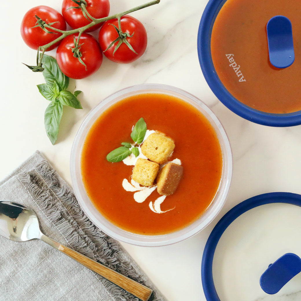 Microwave tomato soup in an Anyday dish for a smooth, rich, and comforting meal. This homemade soup, thickened with white bread, delivers deep tomato flavor in minutes—no need for canned soup.