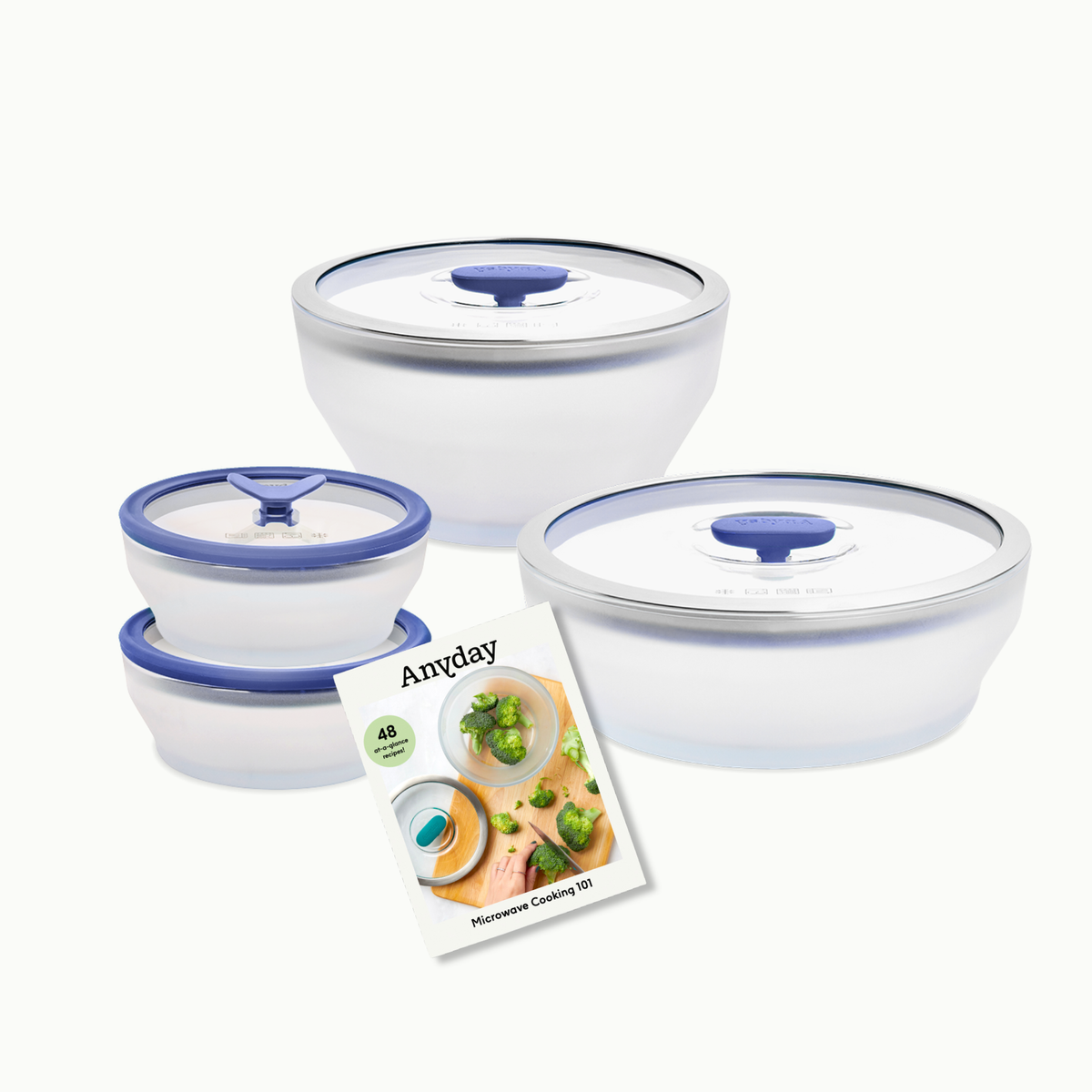 An 8-Piece Frosted Glass Round Dish Starter Set featuring frosted glass dishes with silicone-handled lids and a matching cookbooklet.