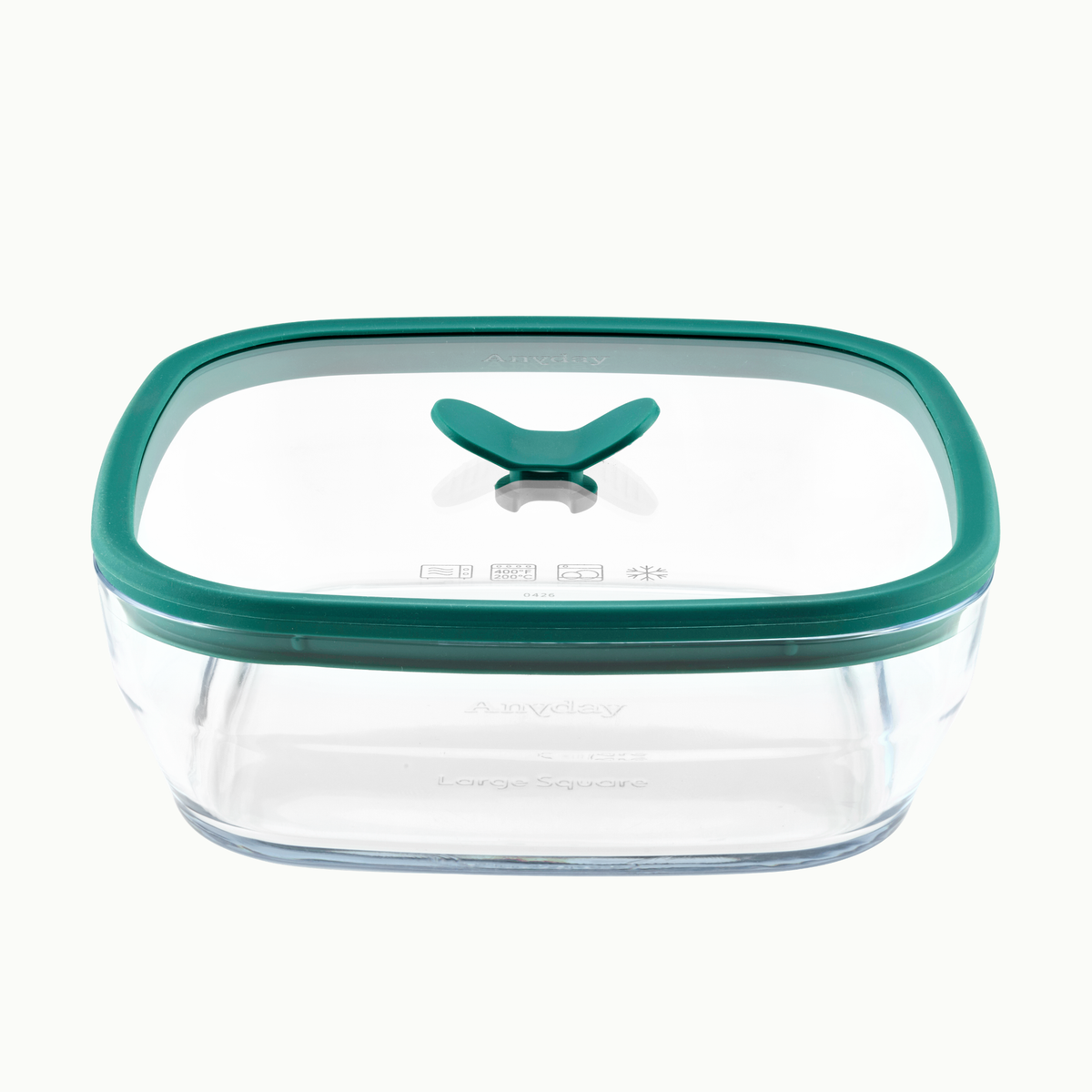 Anyday 10-Cup Glass Square Shallow Dish in kale, a square frosted glass food storage container with a green vented glass lid and a central lifting handle.