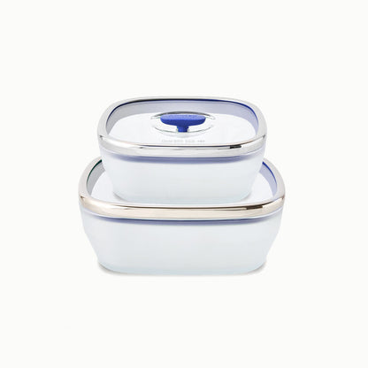 Two square frosted glass 4-Piece Glass Square Dish Set containers stacked on each other, with the top lid featuring a blueberry silicone vent for microwave food storage.