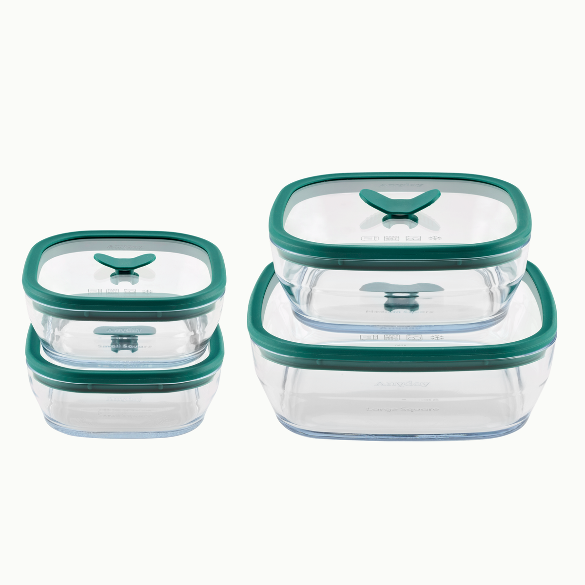 Two stacks of four square frosted glass 8-Piece Glass Square Dish Set cookware dishes with Kale-colored silicone lids.