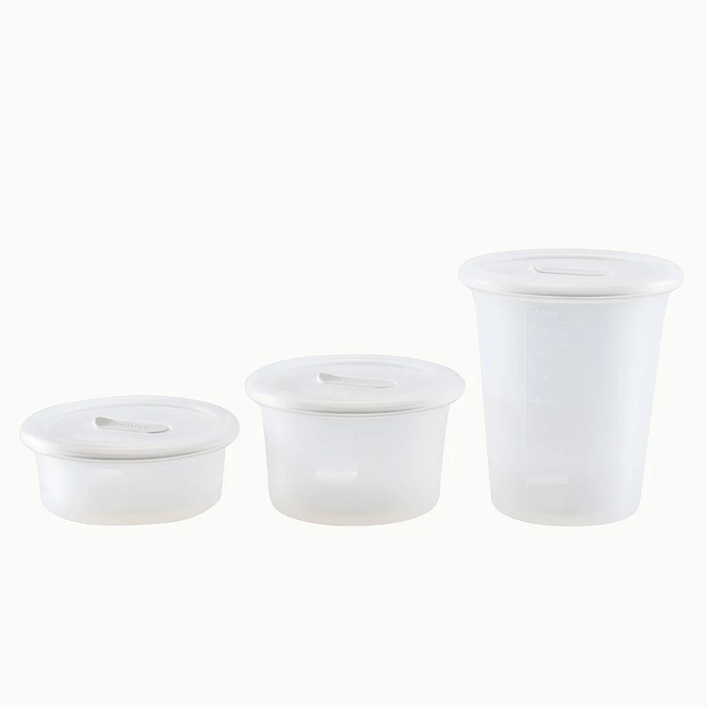 The Anyday Anydeli Mixed Set, 3-Pack in Mochi features three translucent, nontoxic reusable silicone containers with matching lids in increasing size, displayed against a plain white background.