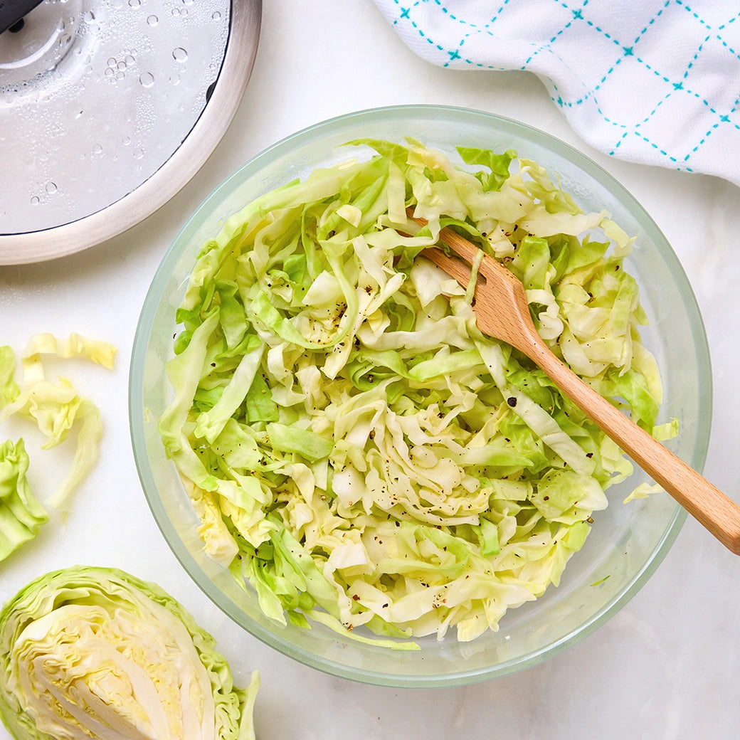 Perfectly cooked cabbage made and served in the glass Anyday dish, providing a tender and flavorful side dish. This method ensures evenly cooked cabbage, ideal for adding to stir-fries, soups, or enjoying on its own.