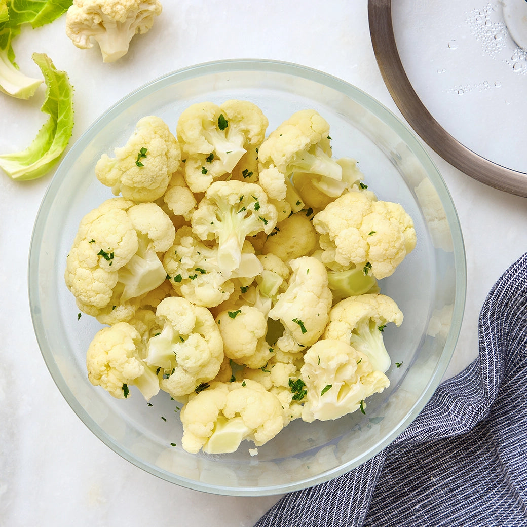 Perfectly cooked cauliflower made and served in the glass Anyday dish, providing a tender and versatile side dish. This method ensures evenly cooked cauliflower, reducing unwanted aromas, ideal for mashing or adding to various recipes.