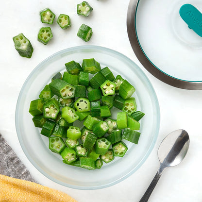 Microwave-steamed okra served in an Anyday dish, bright green and tender, ready to eat with a light splash of vinegar for added flavor.