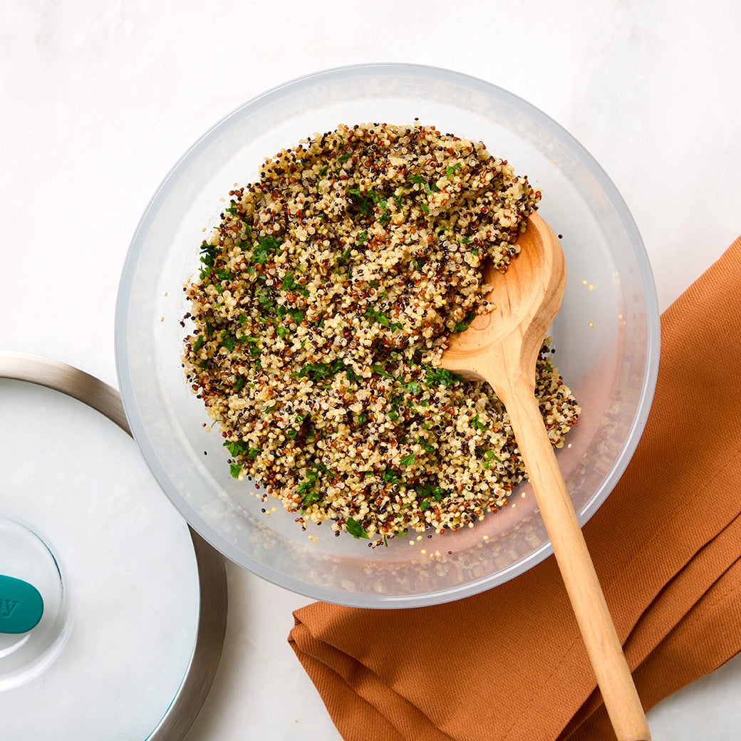 Perfectly cooked quinoa made and served in the glass Anyday dish, providing fluffy and nutrient-rich grains. This method ensures evenly cooked quinoa, ideal for adding to salads, bowls, or as a healthy side dish.