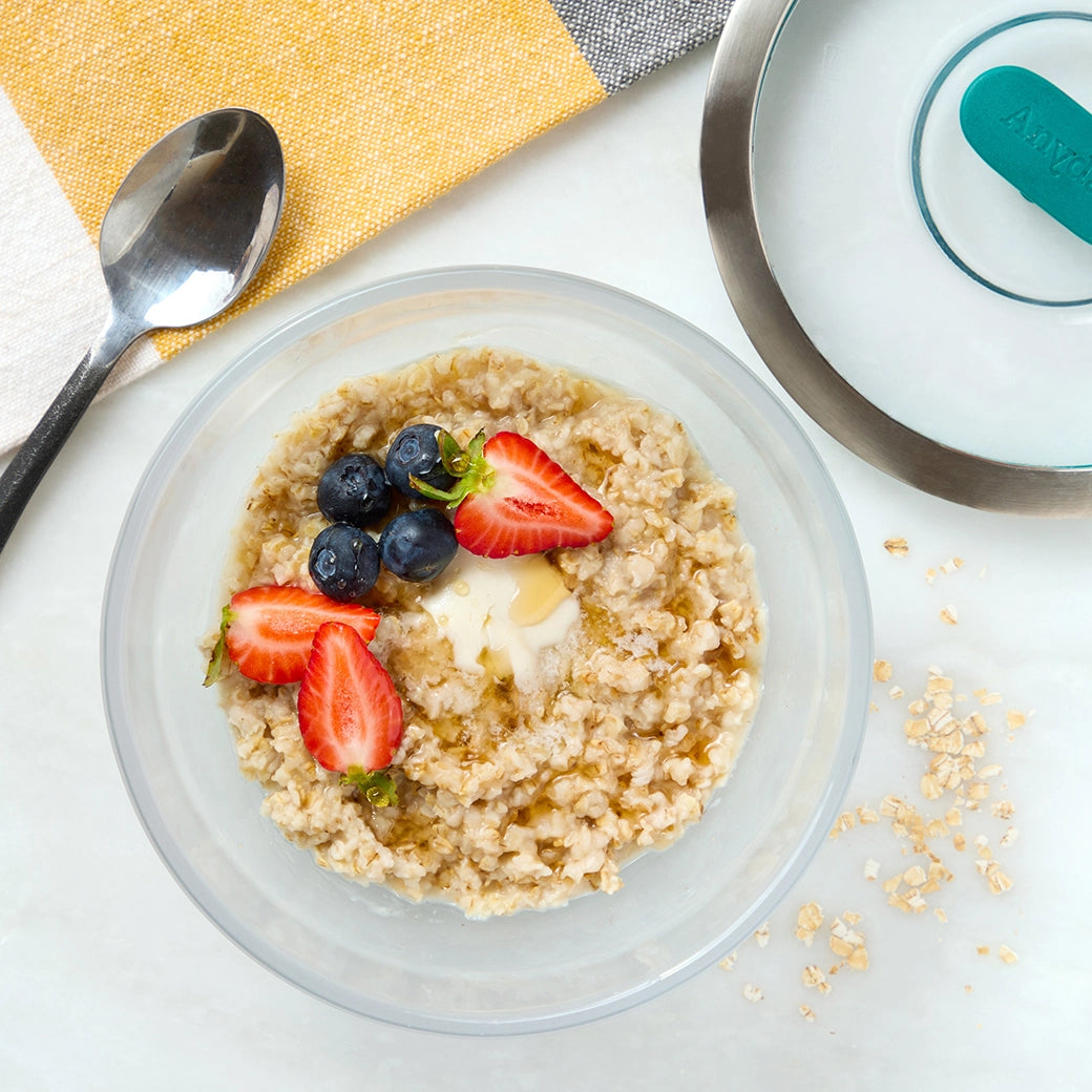 Perfectly cooked steel-cut oats in the glass Anyday dish, offering a nutritious and filling breakfast option. The oats are gently cooked in the microwave with no risk of burning and can be stored in the same container for convenience, making meal prep and quick breakfasts easy and efficient.