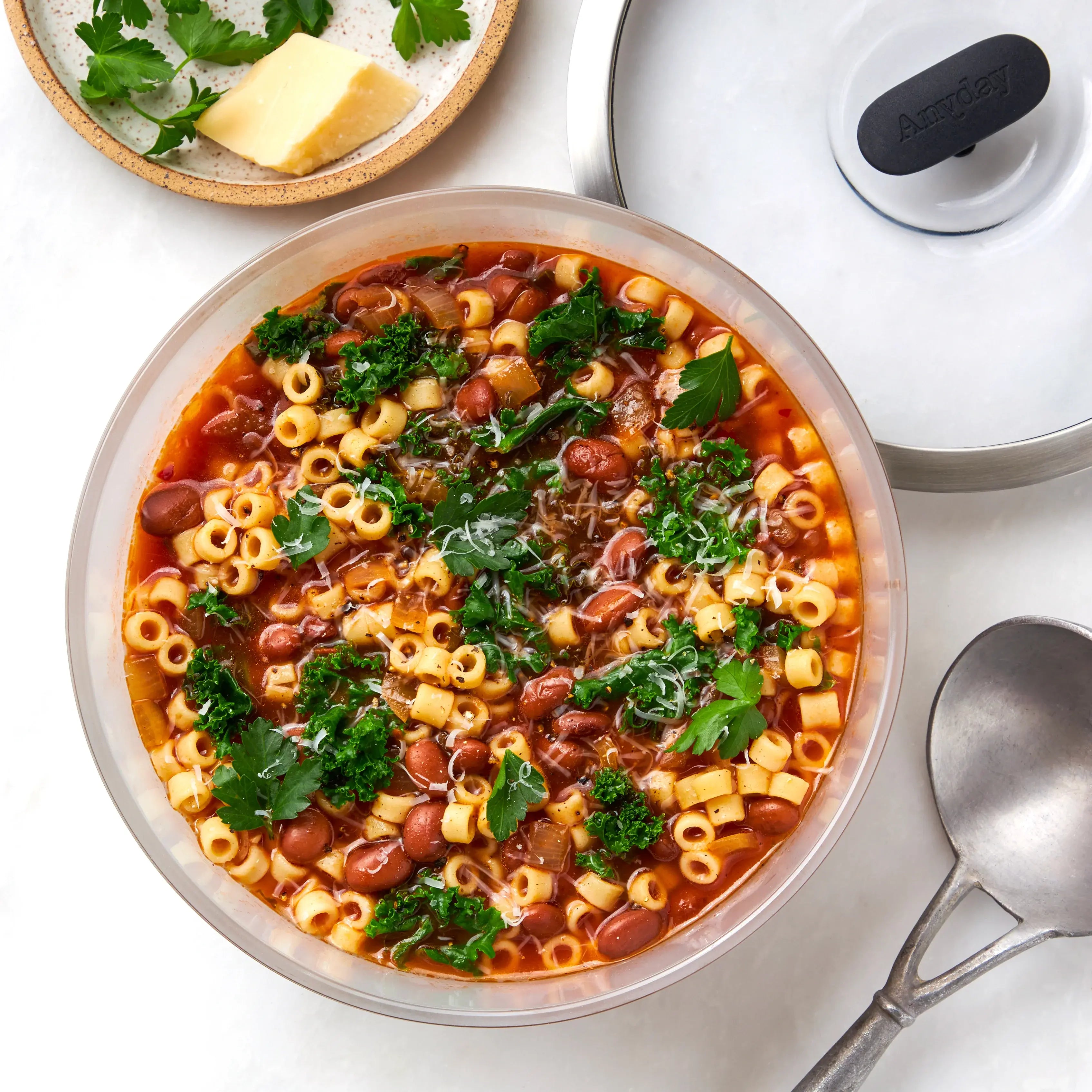 Hearty Pasta Fagioli Soup made in the glass Anyday dish, featuring tender pasta, savory beans, and a rich tomato broth. This easy microwave recipe offers a comforting and delicious meal, perfect for a cozy dinner.