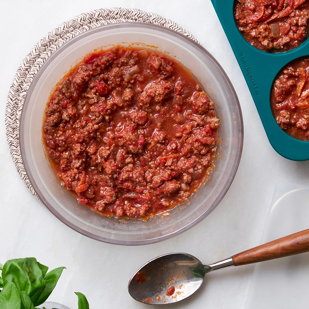 Rich and hearty quick Bolognese made in the glass Anyday dish, featuring ground beef, tomatoes, and aromatic herbs. This quick and easy microwave recipe delivers a flavorful and comforting meat sauce, perfect for pairing with pasta for a satisfying meal.