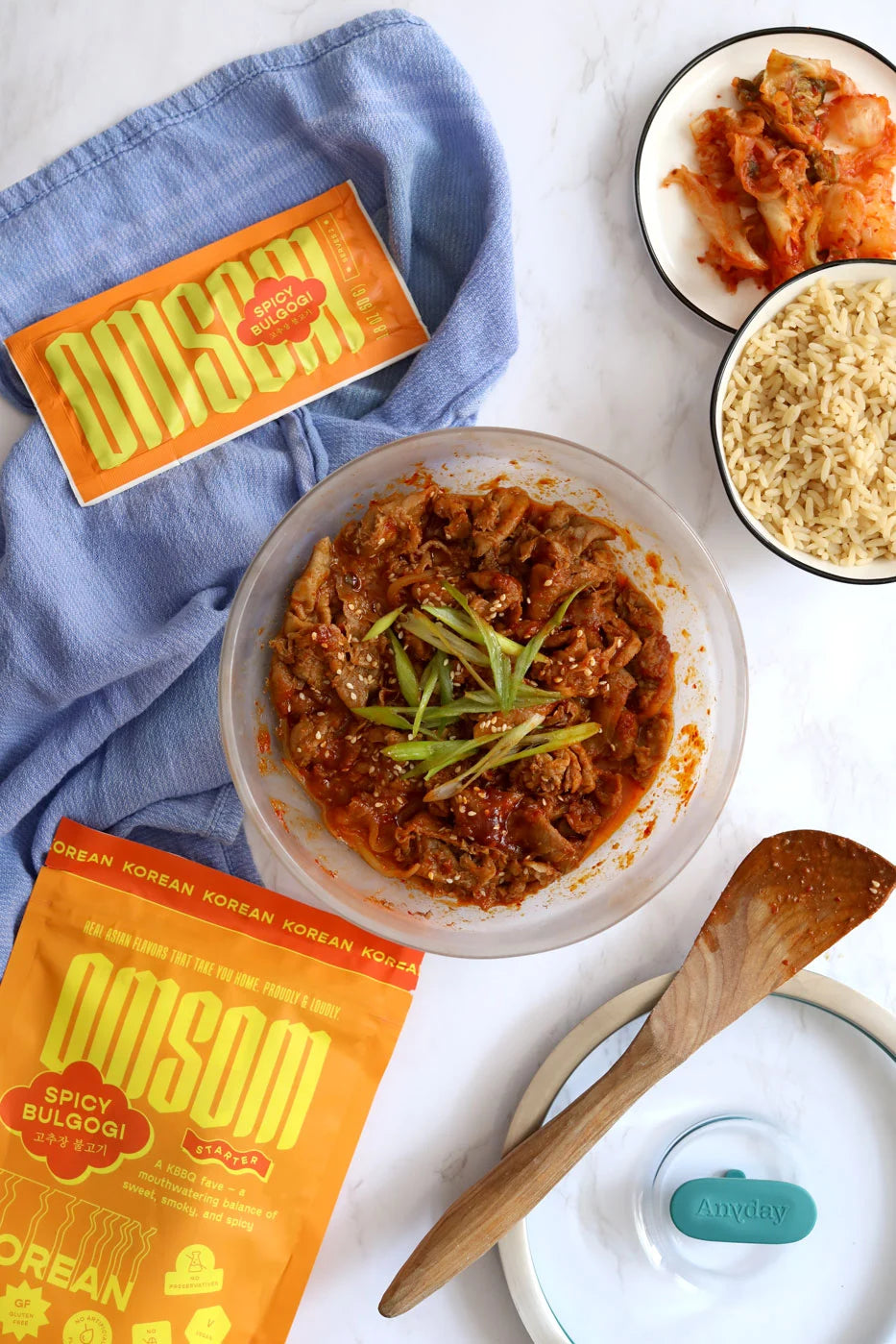 Flavorful pork bulgogi made in the glass Anyday dish, featuring tender pork marinated in a savory and slightly sweet Korean sauce from Omsom. This quick and easy microwave recipe delivers a delicious and umami-rich meal, perfect for a satisfying dinner.