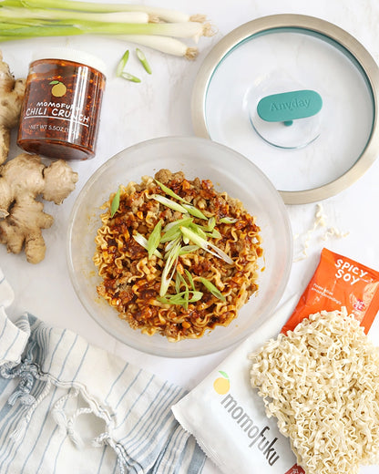 Delicious Momofuku tangy chili pork noodles made in the glass Anyday dish, featuring tender pork, savory noodles, and a tangy chili sauce. This quick and flavorful microwave recipe delivers a perfect balance of heat and tang, ideal for a satisfying and umami-rich meal.