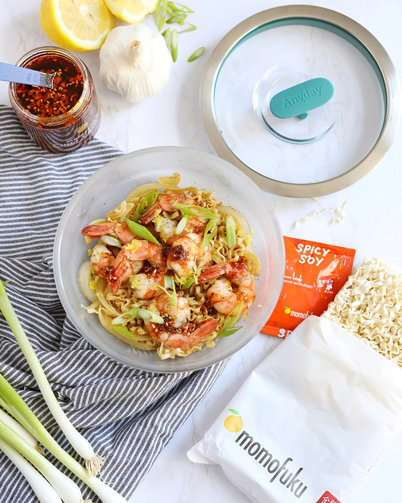 Flavorful Momofuku spicy soy shrimp noodles made in the glass Anyday dish, featuring succulent shrimp, tender noodles, and a savory soy-based sauce with a spicy kick. This quick and easy microwave recipe delivers a delicious, umami-rich meal, perfect for a satisfying dinner.