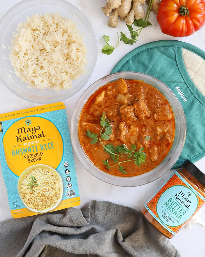 Super quick Maya Kaimal's Speedy Butter Chicken made in the glass Anyday dish, consisting of tender chicken thighs simmered in a rich and savory butter masala sauce. This method ensures flavorful and juicy chicken, perfect for a delicious meal.