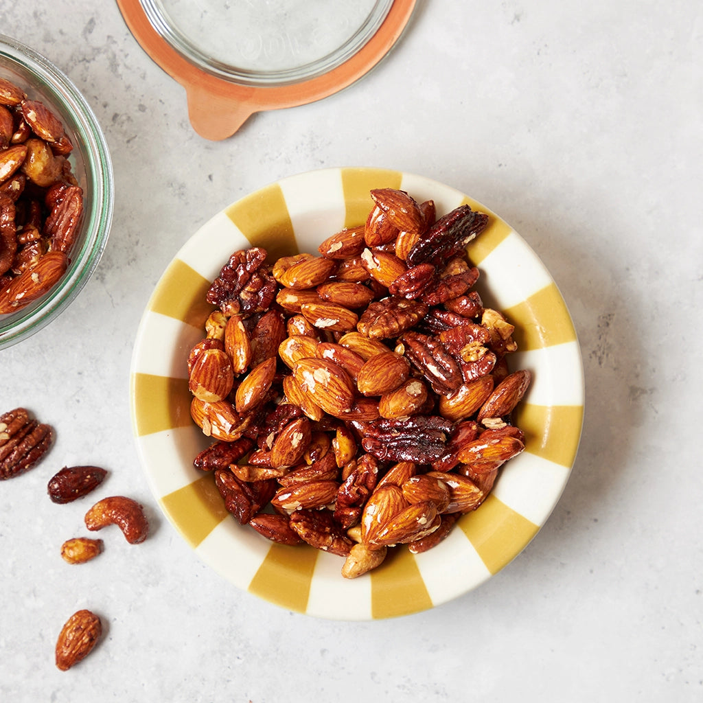 Candied Nuts made and served in the glass Anyday dish, featuring a mix of nuts coated in a sweet, caramelized glaze.