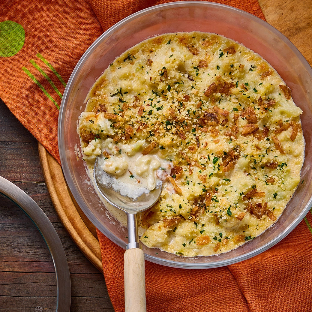 Cheese Cauliflower Casserole made and served in the glass Anyday dish, featuring tender cauliflower baked in a creamy cheese sauce.