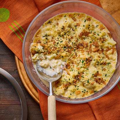 Cheese Cauliflower Casserole made and served in the glass Anyday dish, featuring tender cauliflower baked in a creamy cheese sauce.