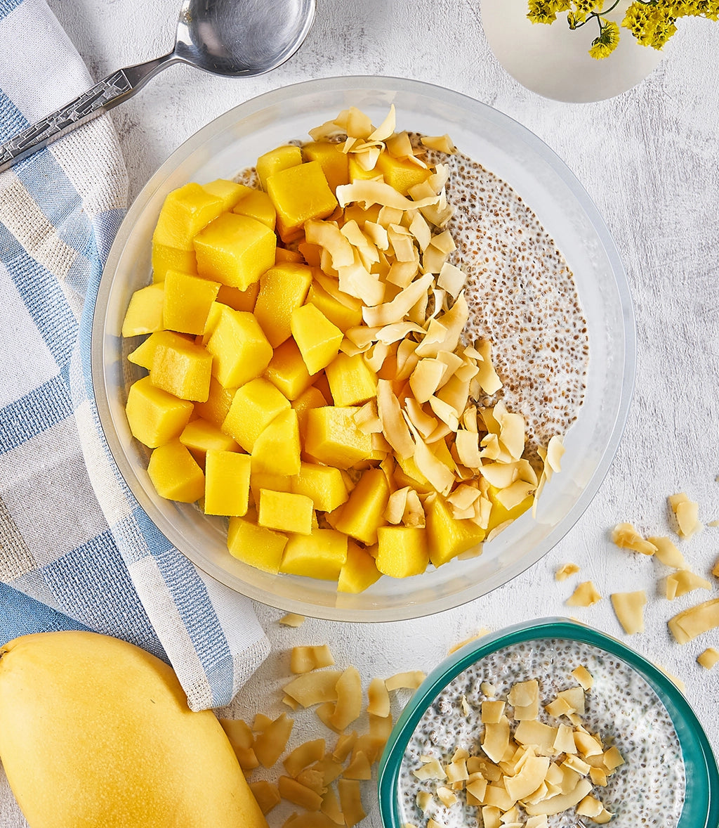 Coconut and Mango Chia Pudding made and served in the glass Anyday dish, featuring creamy coconut chia pudding topped with fresh mango slices.