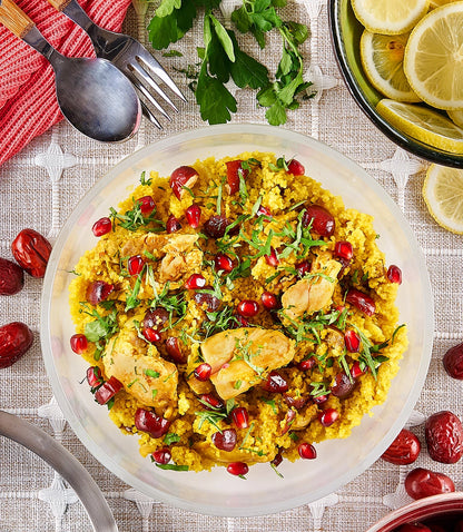 Couscous with Lemon, Chicken, and Dates made and served in the glass Anyday dish, featuring fluffy couscous mixed with tender chicken, sweet dates, and a hint of lemon.