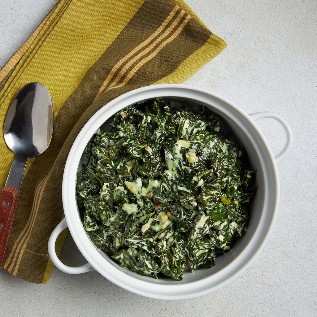 Creamed Kale made and served in the glass Anyday dish, featuring tender kale in a rich, creamy sauce.