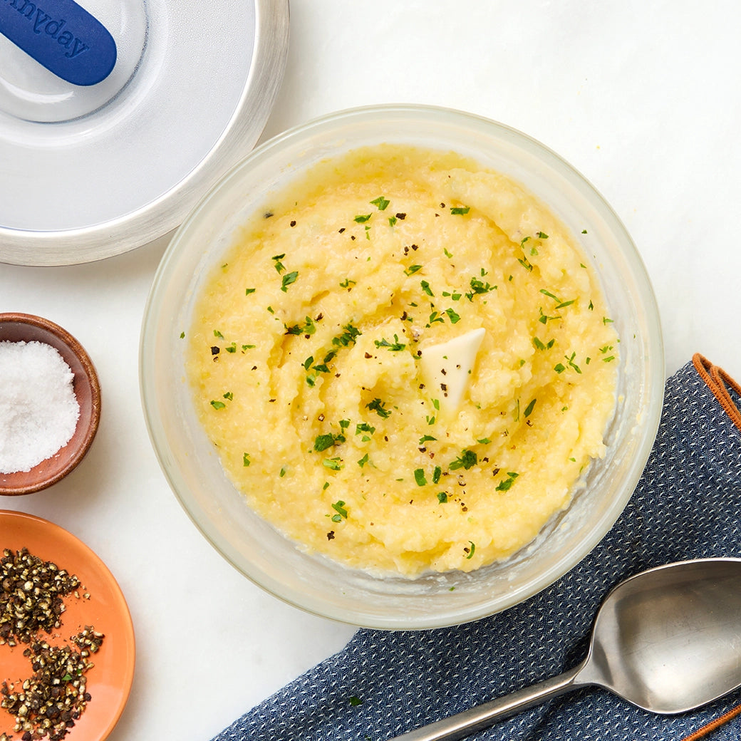 Creamy polenta cooked in the microwave using the glass Anyday dish, ensuring a smooth and rich texture with minimal effort. Enjoy a quick and comforting side dish or base for your favorite toppings, ready in minutes.