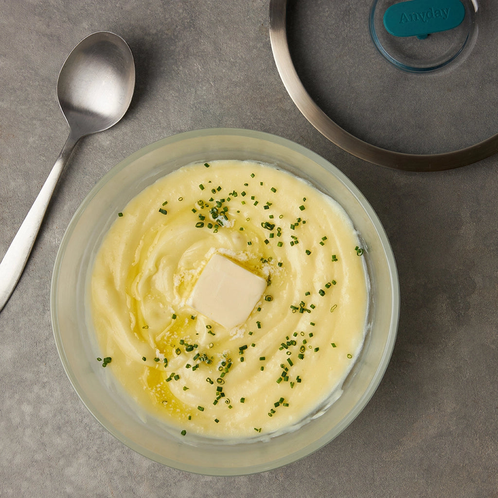 Creamy Mashed Potatoes made and served in the glass Anyday dish, featuring smooth potatoes blended with butter, milk, and seasoned with salt and pepper.