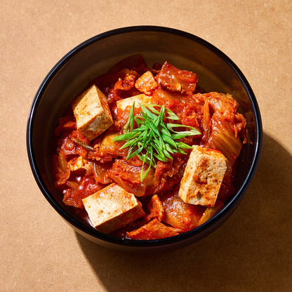 Microwave kimchi jjigae made in the microwave in an Anyday Dish. 