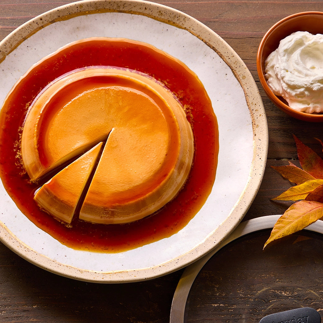 Flan made and served in the glass Anyday dish, featuring a smooth and creamy caramel custard dessert with a rich, golden caramel sauce.