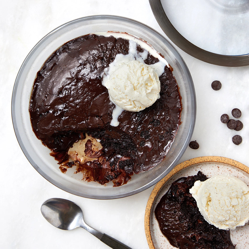 Fudge Brownies made and served in the glass Anyday dish, featuring rich, dense chocolate brownies with a glossy top and fudgy center.