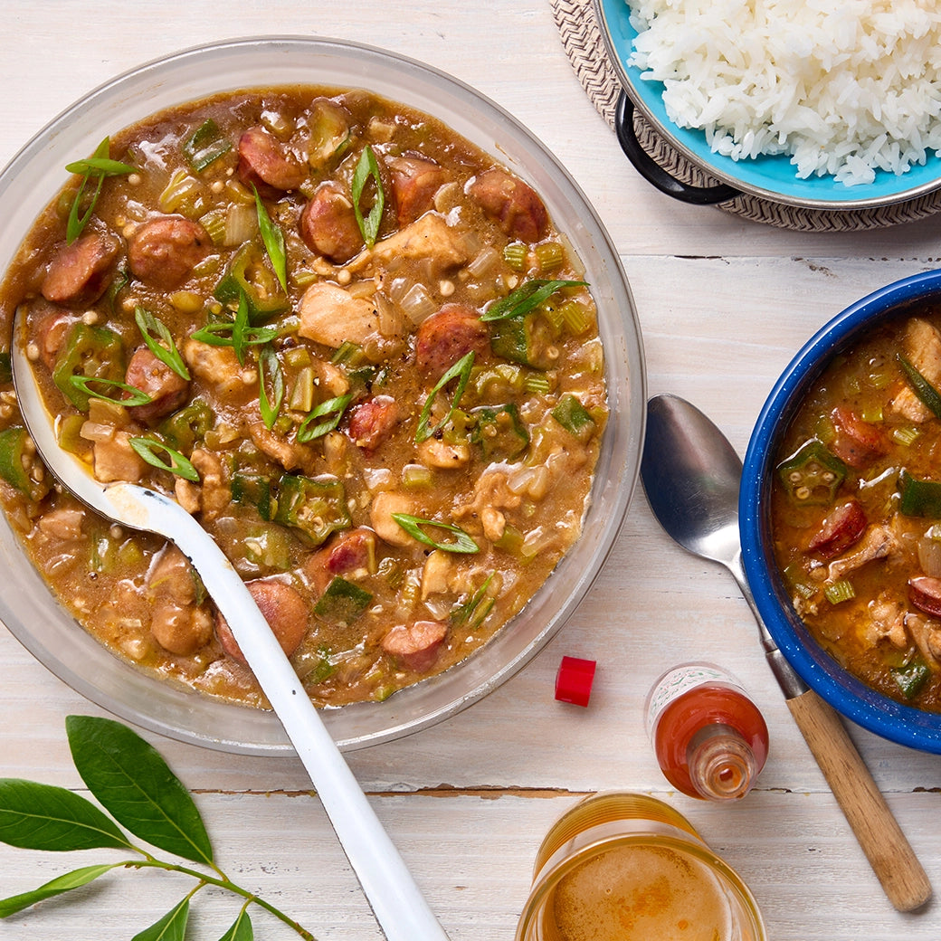 Chicken Gumbo made and served in the glass Anyday dish, featuring tender chicken, sausage, and vegetables in a rich, flavorful broth.