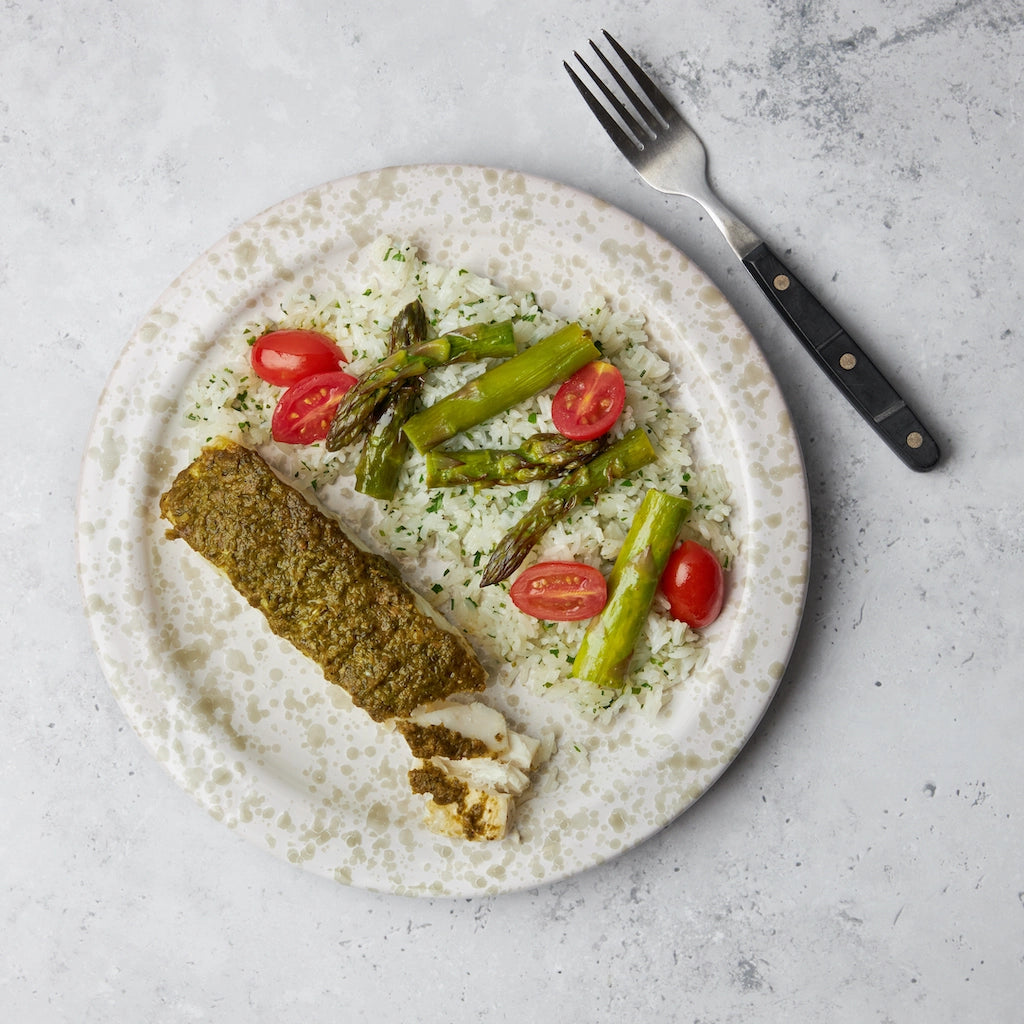 Halibut with Pesto and Asparagus prepared and served in the glass Anyday dish, showcasing succulent halibut fillets topped with fresh pesto and accompanied by tender asparagus.