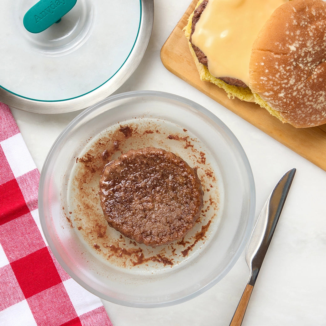 Quickly steamed hamburger patties made in the glass Anyday dish, consisting of juicy burger patties steamed to perfection. This method ensures flavorful and tender burgers, ideal for a quick and delicious meal with minimal cleanup.