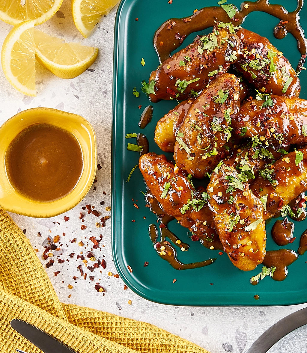 Honey Mustard Chicken Wings made and served in the glass Anyday dish, with tender wings coated in a tangy honey mustard sauce.