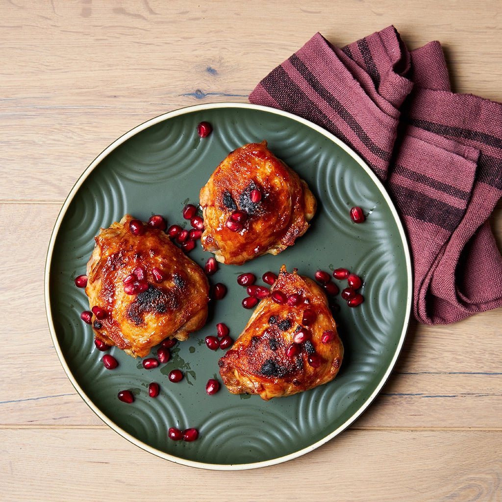 Honey and Harissa Glazed Chicken made and served in the glass Anyday dish, with tender chicken pieces glazed in a sweet and spicy honey-harissa sauce.