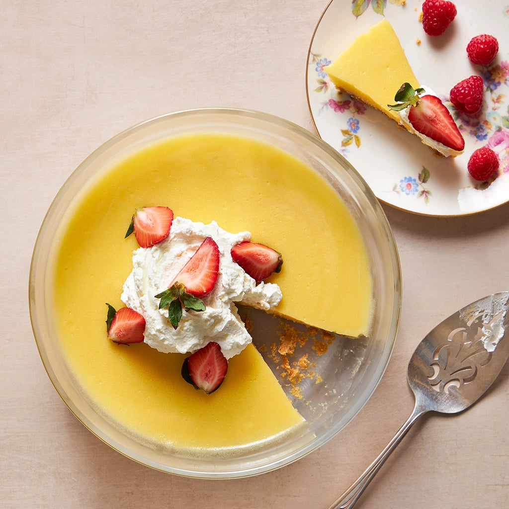 Perfectly cooked Lemon Tart with Graham Cracker Crust made and served in the glass Anyday dish, featuring a buttery graham cracker crust filled with sweet and tangy lemon curd. This method ensures a smooth and zesty filling, ideal for a delightful dessert.