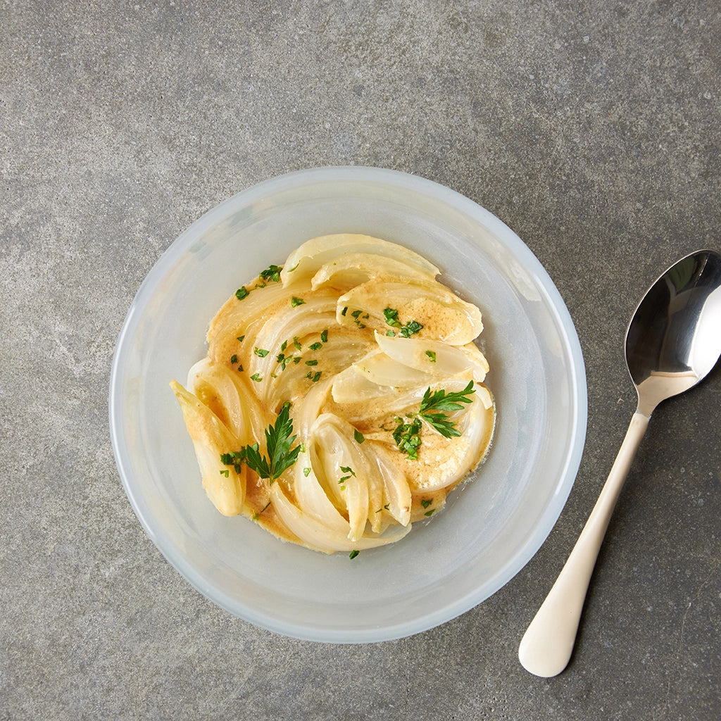 Delicately poached onions in miso butter, made in the glass Anyday dish, featuring tender onions in a rich and savory blend of miso paste and butter. This easy microwave recipe delivers flavorful, umami-packed onions, perfect as a side dish or topping for various meals.