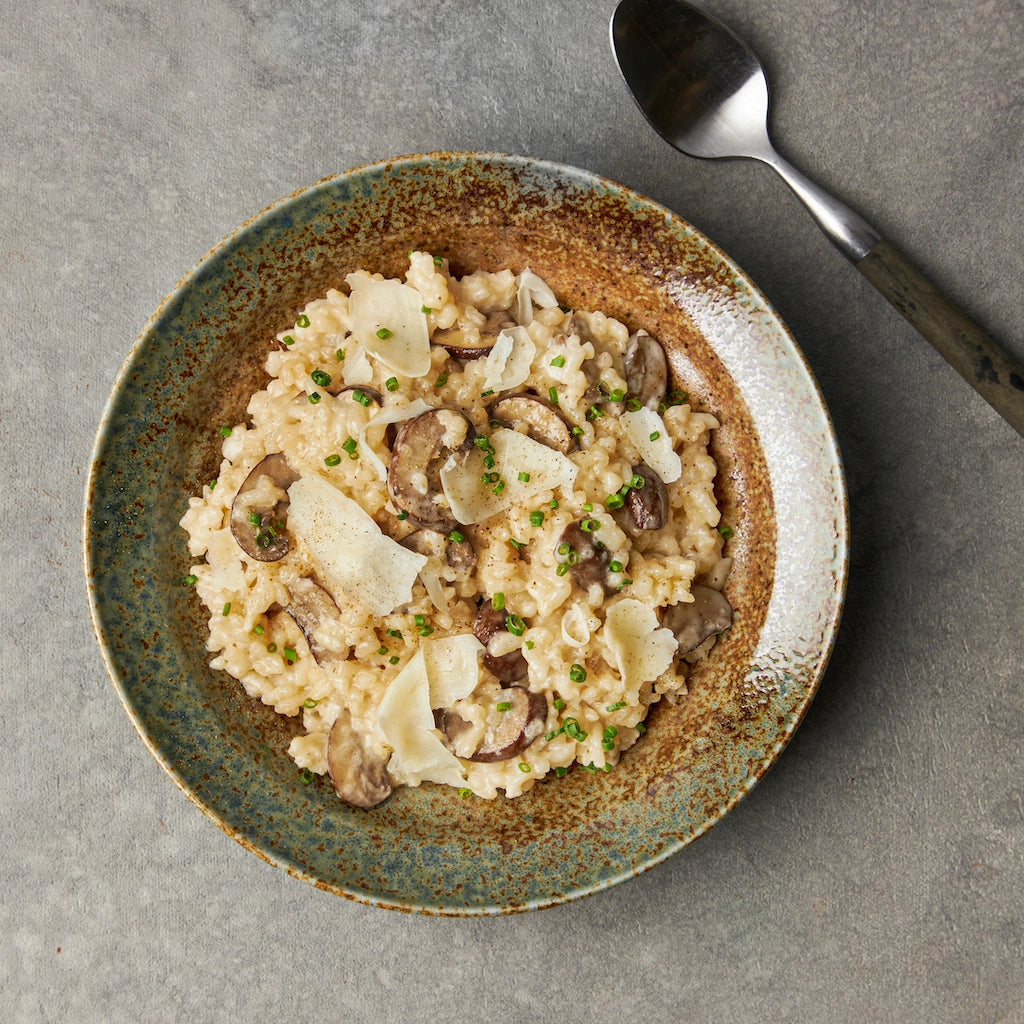 Perfectly creamy mushroom risotto made in the glass Anyday dish, featuring tender Arborio rice and savory mushrooms. This quick and easy microwave recipe ensures a rich and flavorful risotto, ideal for a comforting and delicious meal.