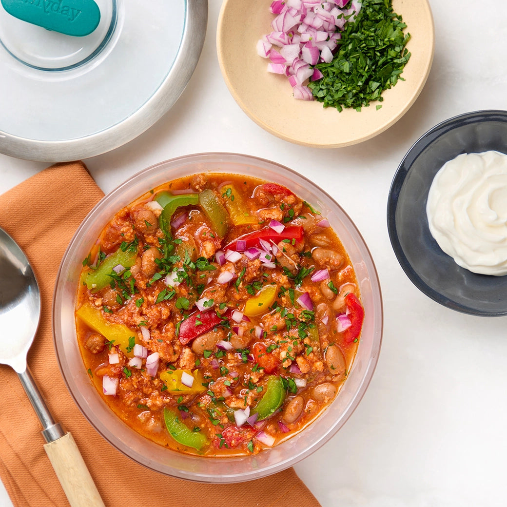 Perfectly hearty turkey chili made and served in the glass Anyday dish, showcasing tender turkey, beans, and a colorful mix of veggies. This flavorful dish is ideal for a comforting meal, offering a simple, nutritious option with minimal cleanup.