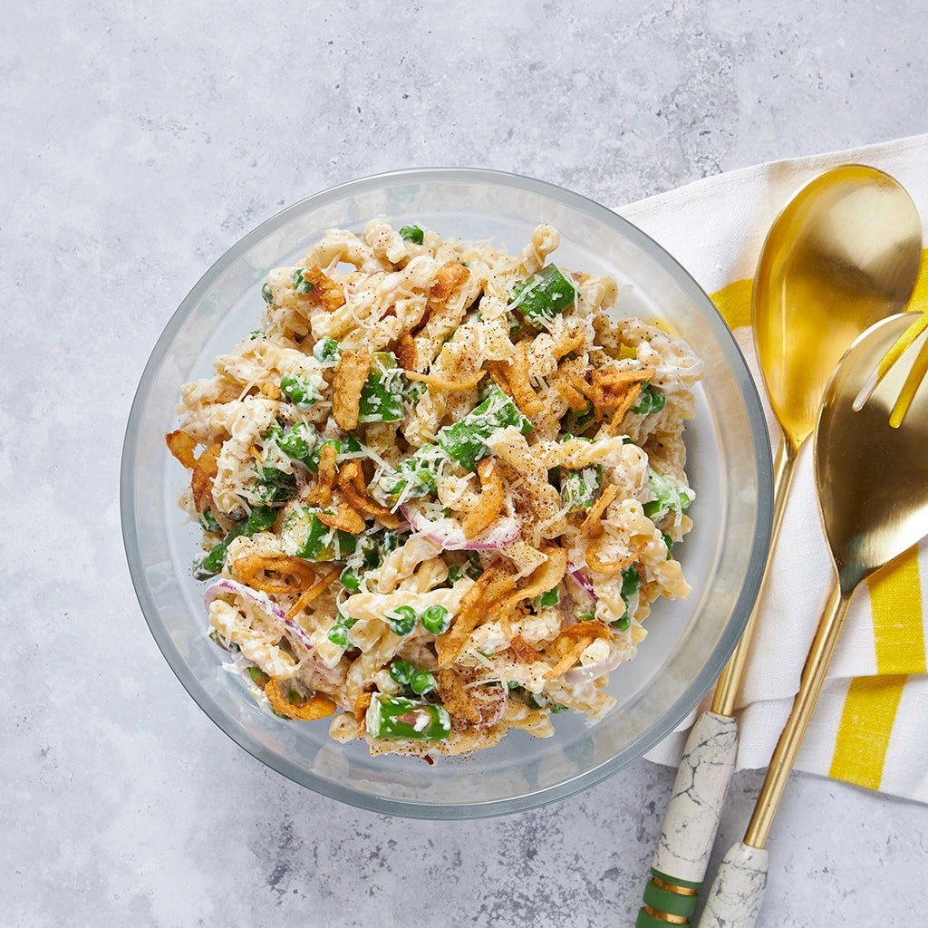 Flavorful Pasta Alfredo Primavera made in the glass Anyday dish, featuring al dente pasta, creamy Alfredo sauce, and fresh vegetables. This quick and easy microwave recipe delivers a rich and satisfying meal, perfect for a convenient and delicious dinner.