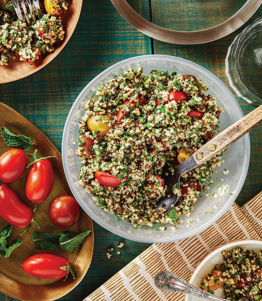 Fresh and nutritious quinoa tabbouleh salad made in the glass Anyday dish, featuring fluffy quinoa, chopped herbs, tomatoes, cucumbers, and a light lemon vinaigrette. This quick and easy microwave recipe delivers a delicious and healthy salad, perfect for a refreshing side dish or light meal.