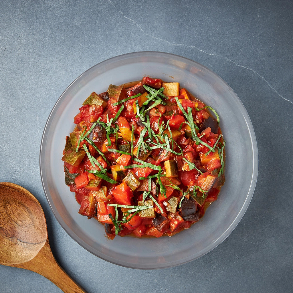 Flavorful ratatouille made in the glass Anyday dish, featuring a medley of tender vegetables like eggplant, zucchini, and bell peppers in a savory tomato sauce. This quick and easy microwave recipe delivers a classic and healthy French dish, perfect for a satisfying meal or side.