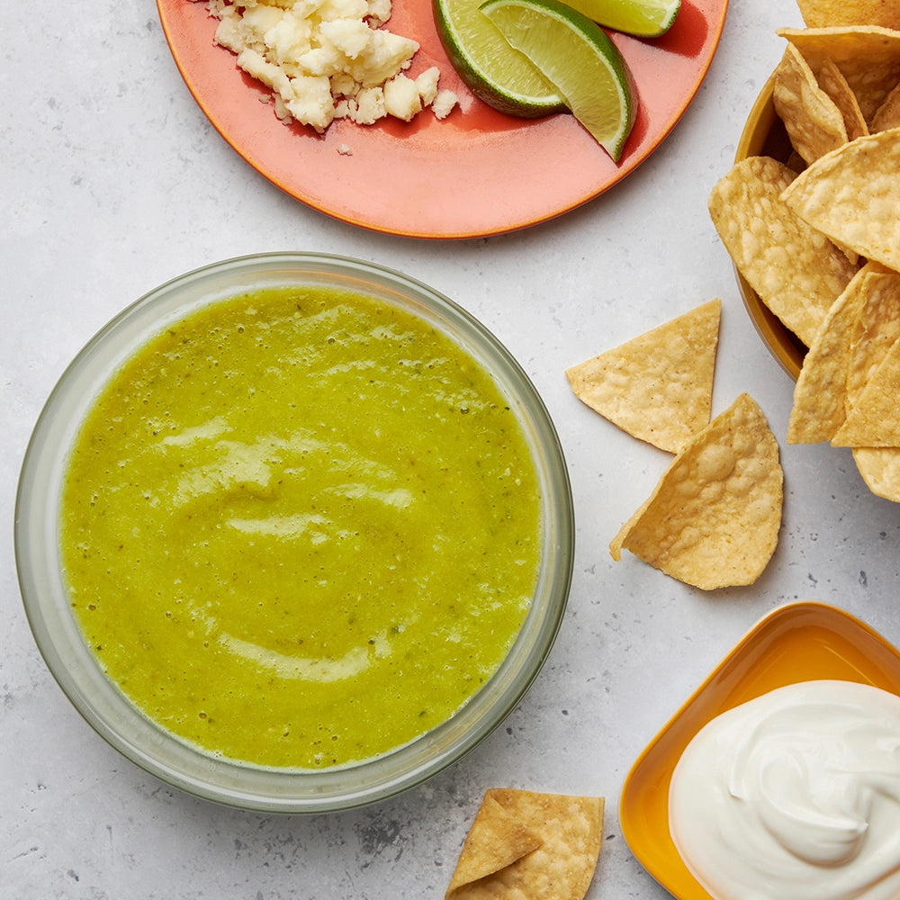 Fresh and zesty microwave salsa verde made in the glass Anyday dish, featuring a vibrant blend of tomatillos, jalapeños, garlic, and cilantro. This quick and easy recipe delivers a tangy and flavorful sauce, perfect for tacos, enchiladas, or as a dip for chips.