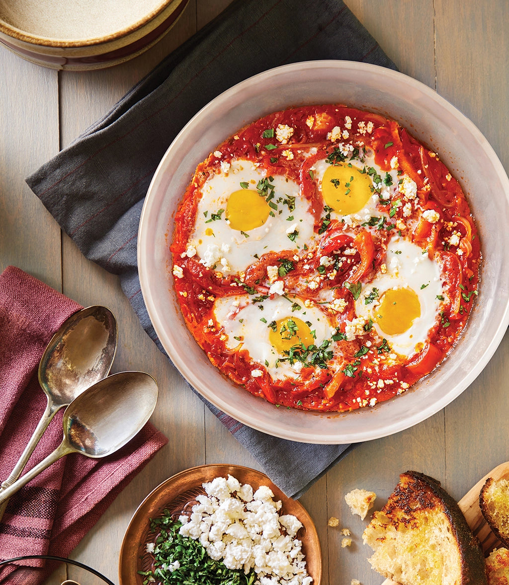 Flavorful shakshuka made in the glass Anyday dish, featuring perfectly poached eggs in a rich tomato sauce. This quick and easy dish preserves natural flavors and ensures a delicious meal with minimal effort.