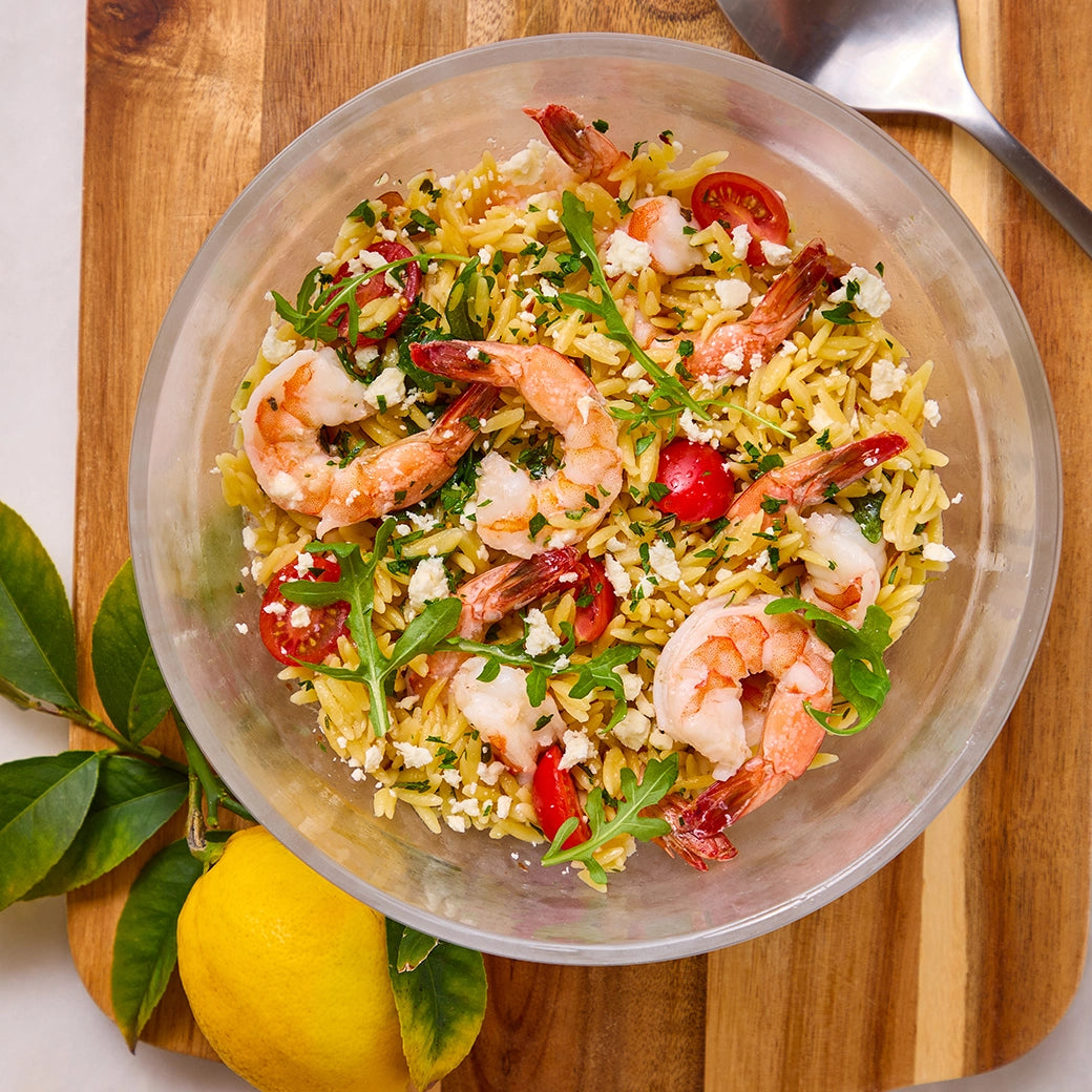 Delicious one-pot orzo with shrimp made in the glass Anyday dish, featuring tender shrimp, al dente orzo, and a flavorful tomato-based sauce. This quick and easy microwave recipe delivers a satisfying and well-balanced meal, perfect for any dinner.