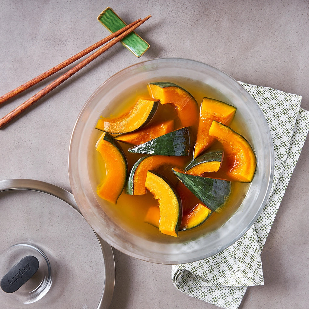 Tender kabocha squash cooked in the microwave with dashi by Chef David Chang, using the glass Anyday dish, capturing rich umami flavors with ease. Perfectly portioned for a quick and satisfying side dish, ready in minutes.