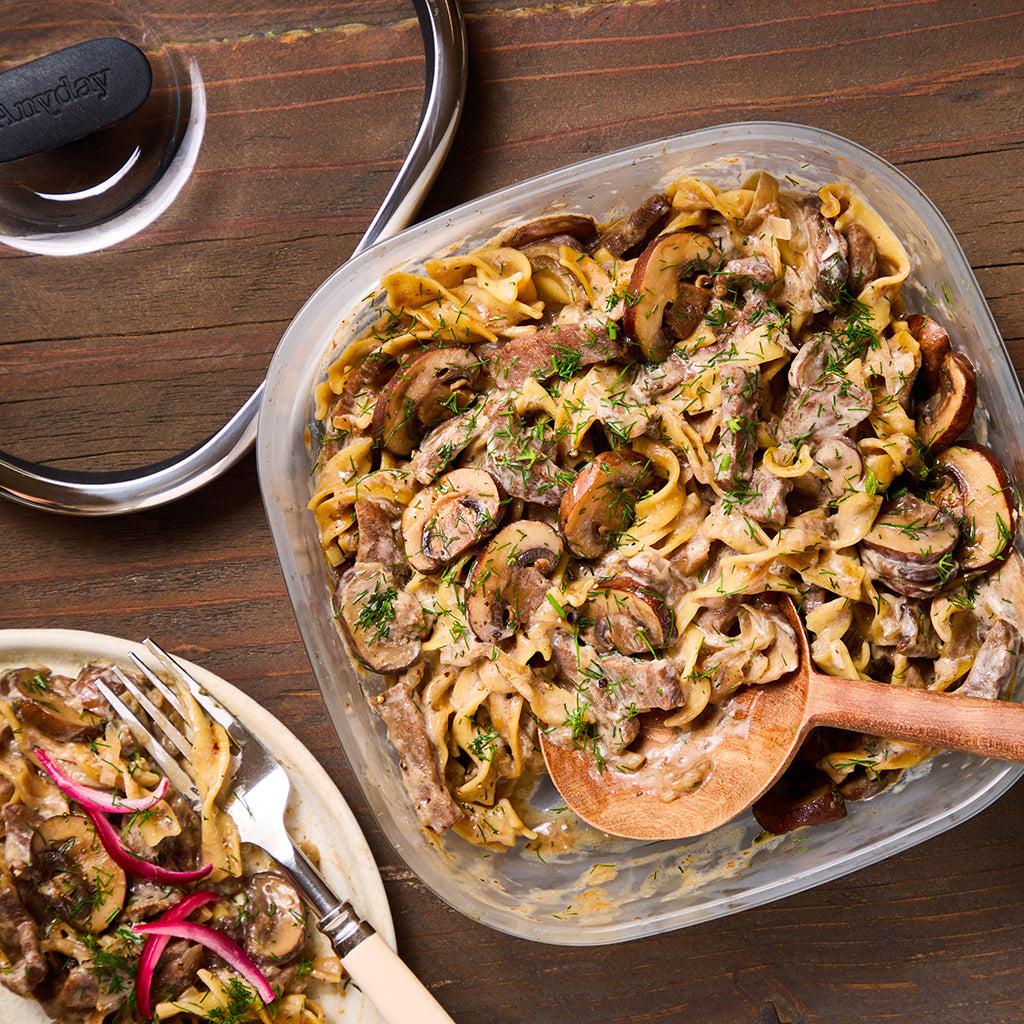 Tender beef stroganoff served over egg noodles, made in an Anyday dish, featuring a creamy sauce enriched with mushrooms and onions. This comforting dish is perfect for a hearty meal any night of the week