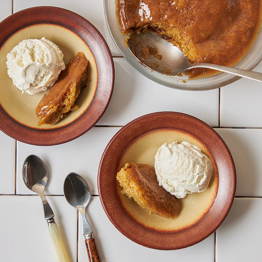 Sticky toffee pudding cake made in the microwave using the glass Anyday dish, resulting in a rich, moist cake drizzled with a decadent toffee sauce. Enjoy a quick and indulgent dessert, ready in minutes.