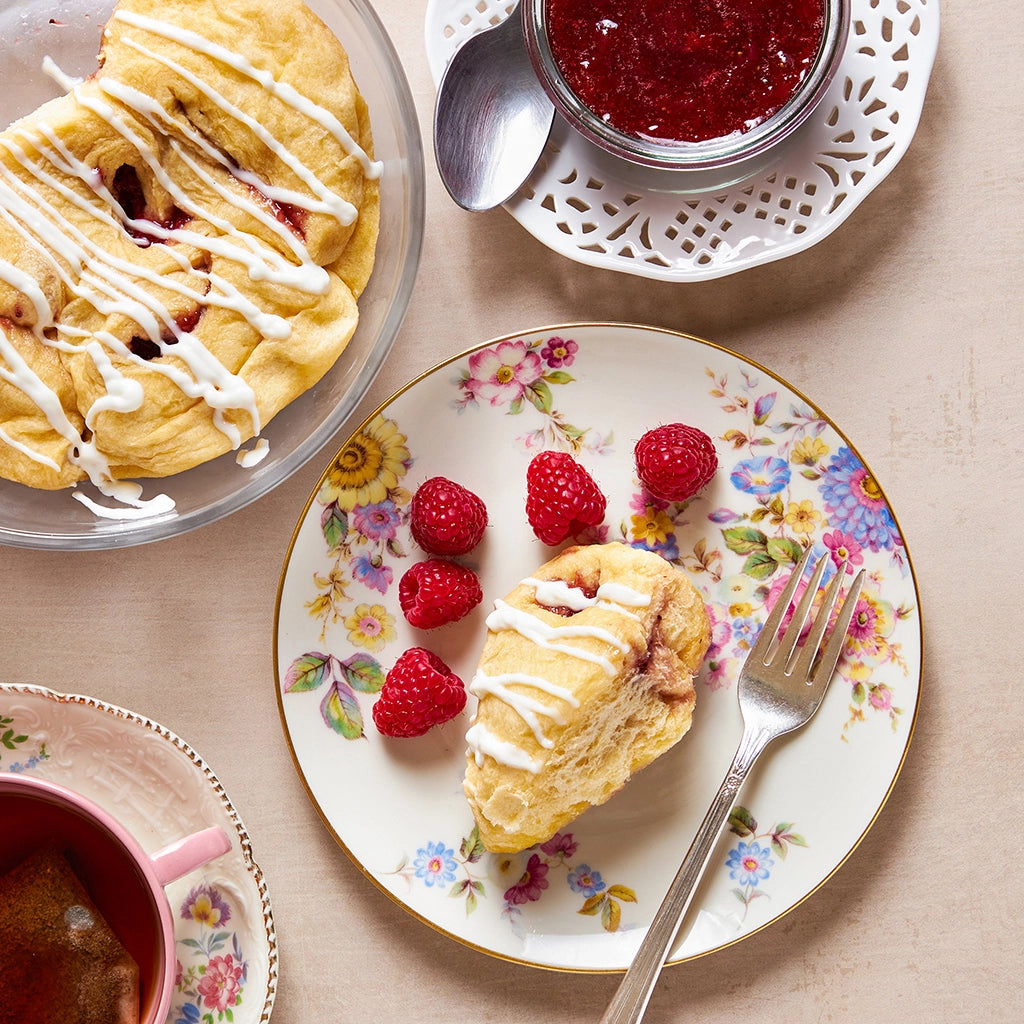 Microwave strawberry jam rolls made in the glass Anyday dish, featuring soft, fluffy rolls filled with sweet strawberry jam. Enjoy a quick and delightful treat, ready in minutes.