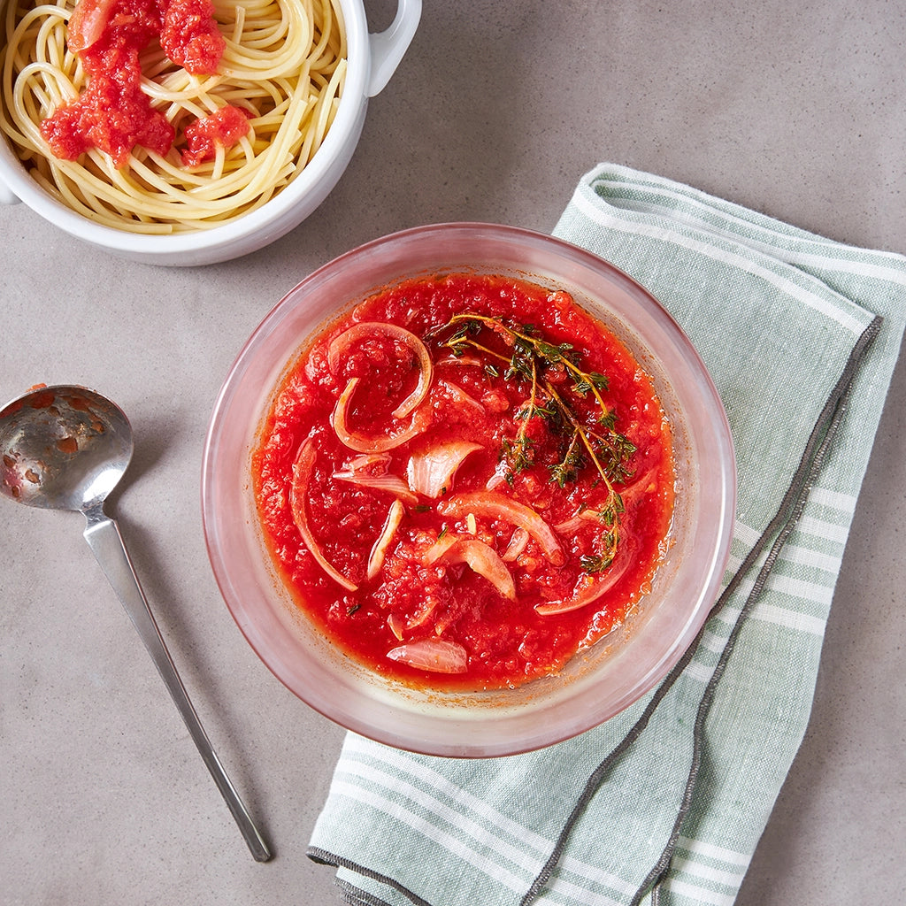 Microwave Tomato Sauce made and served in the glass Anyday dish, featuring a rich and flavorful tomato sauce perfect for pasta and other dishes.